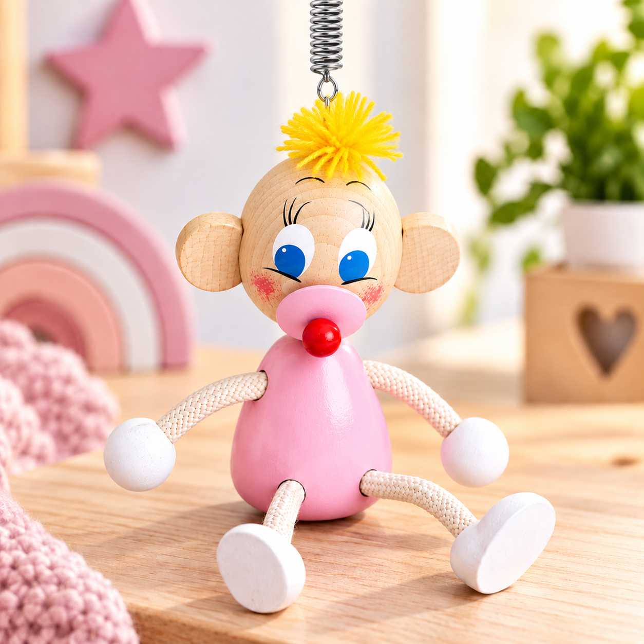 Schwingfigur Baby rosa